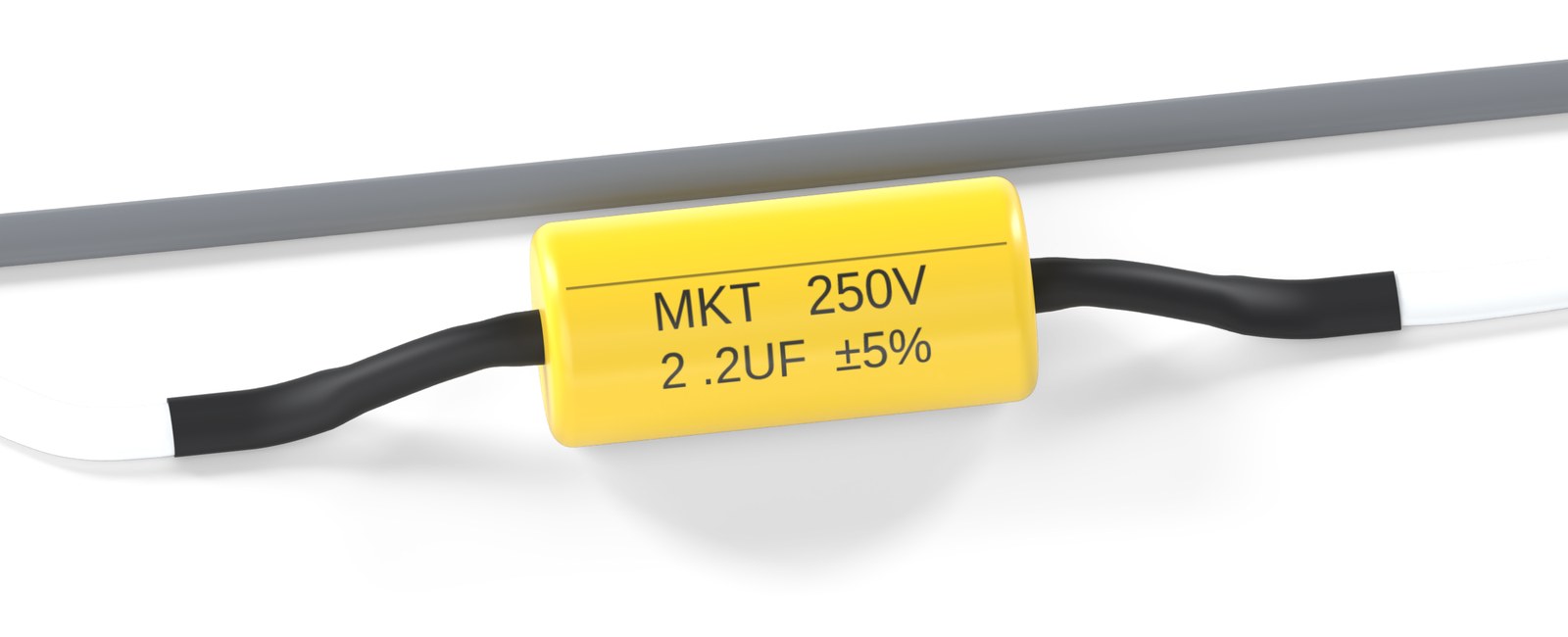 Gele MKT-condensator 2,2 µF in de witte draad van het tweetersnoer, aan beide kanten gesoldeerd met een zwarte krimpkous over de las